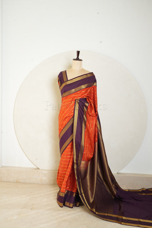 Rust Orange Saree with Purple Rettapet Border