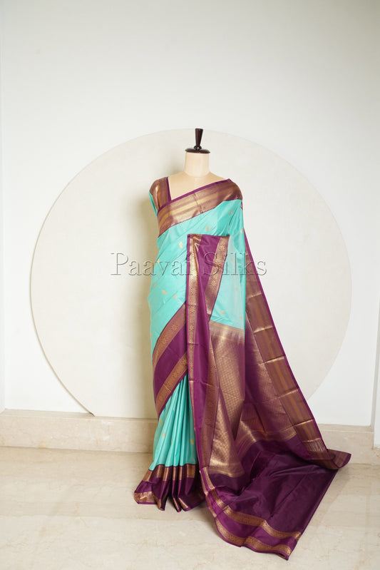 Teal Green Saree with Purple Rettapet Border