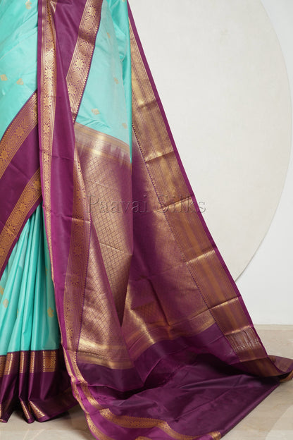 Teal Green Saree with Purple Rettapet Border