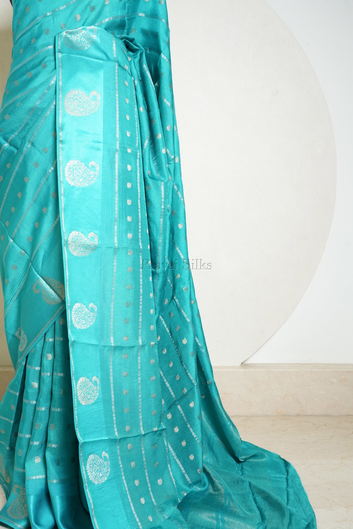 Teal Semi Crepe Silk Saree with Purple Blouse