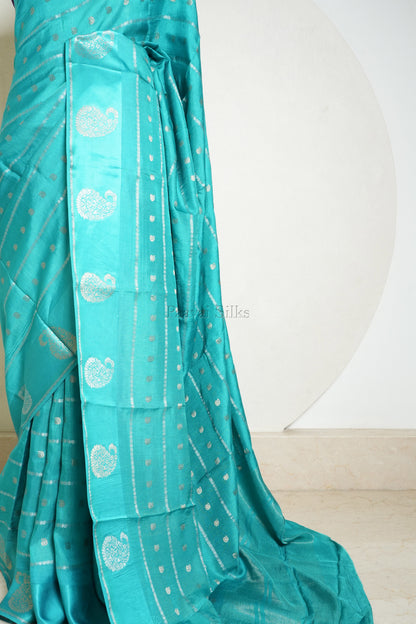 Teal Semi Crepe Silk Saree with Purple Blouse