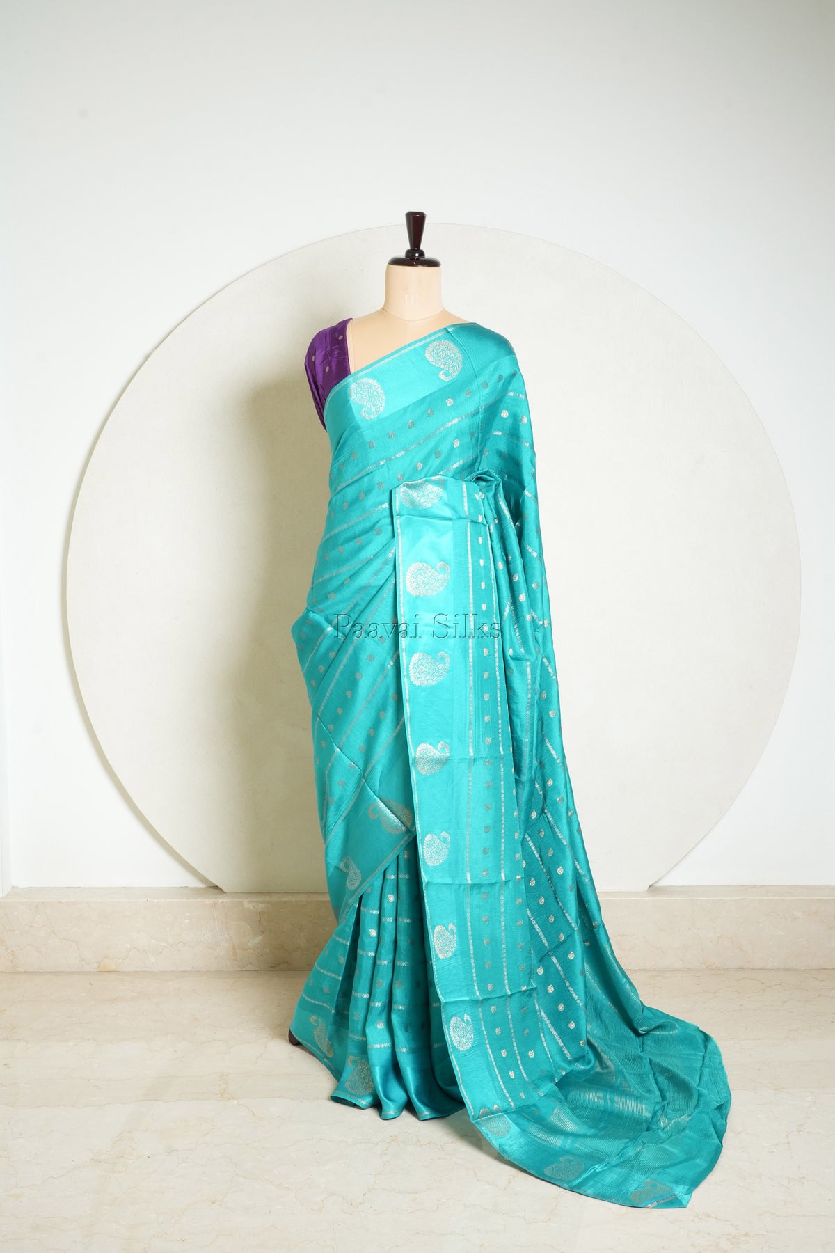 Teal Semi Crepe Silk Saree with Purple Blouse