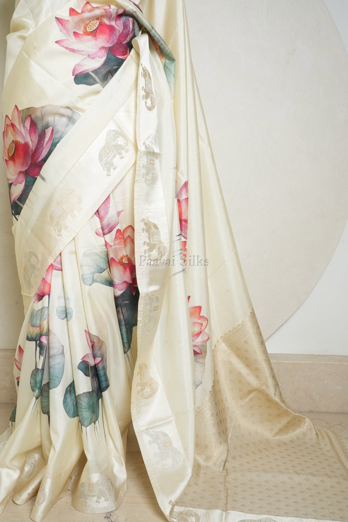 Ivory Semi Silk Saree with Lotus Print & Gold Zari Elephant Motifs