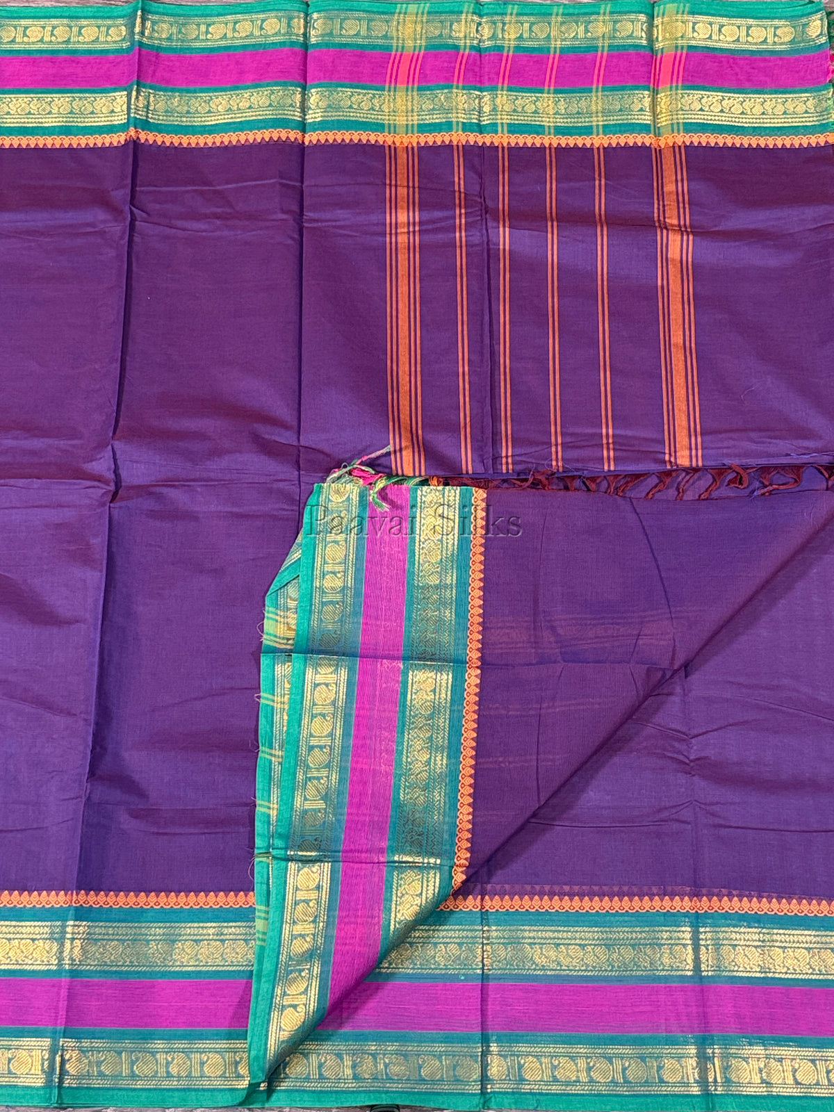 urple Saree with Peacock Green & Magenta Zari Border