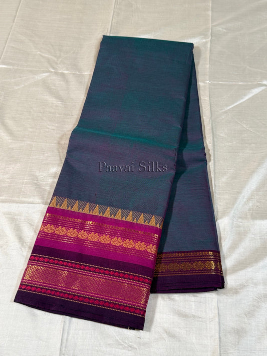 Dual shade peacock blue Saree with Rani Pink & Purple Zari Border