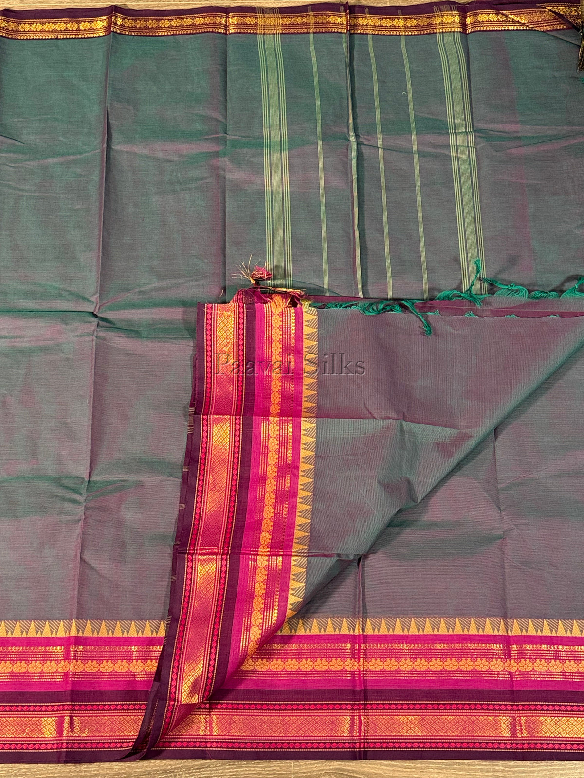 Dual shade peacock blue Saree with Rani Pink & Purple Zari Border