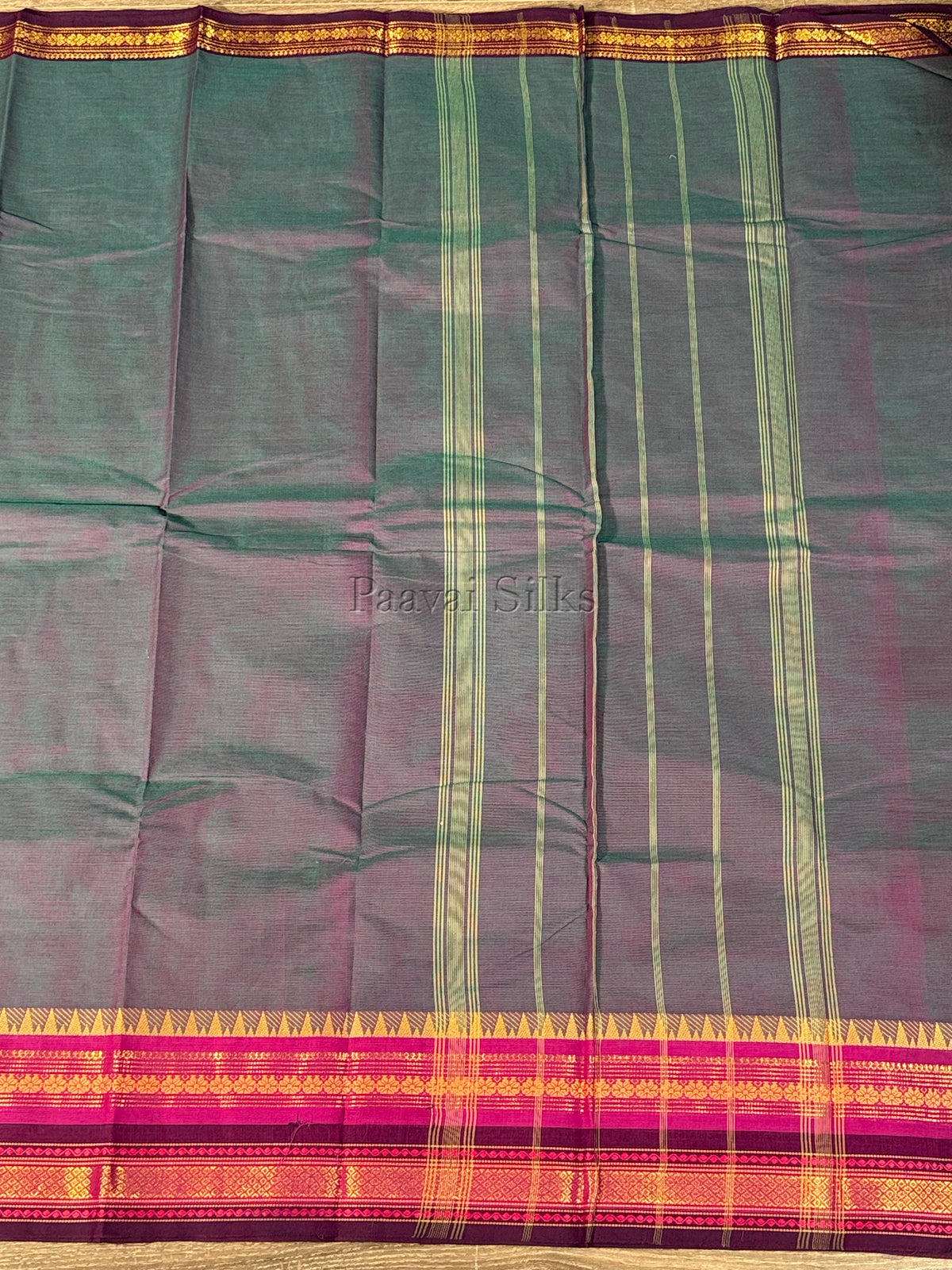 Dual shade peacock blue Saree with Rani Pink & Purple Zari Border