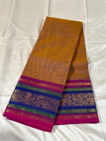 Antique Mustard Saree with Royal Blue & Magenta Peacock Zari Border